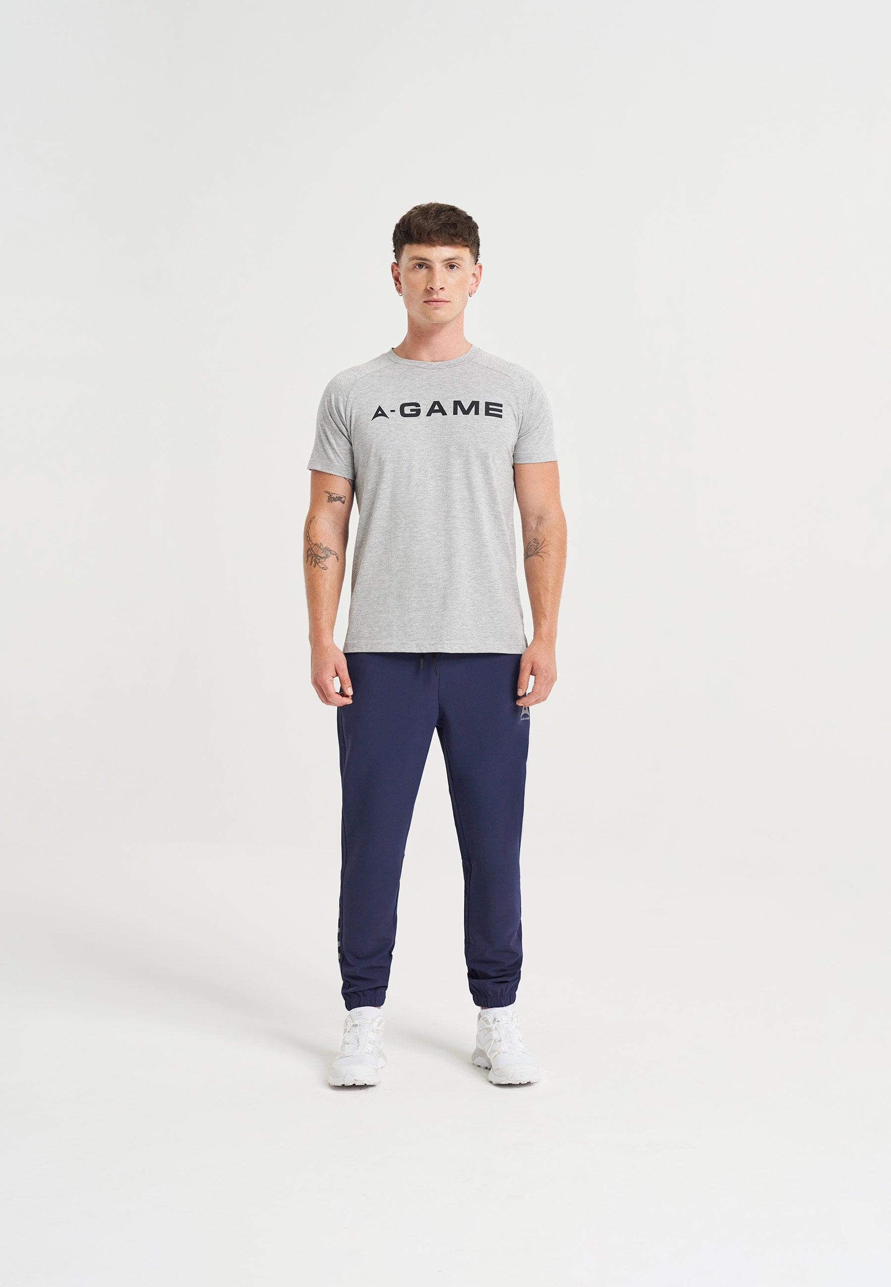 PANTALON D'ENTRAÎNEMENT À REVÊTEMENTS A-GAME POUR HOMMES - MARINE